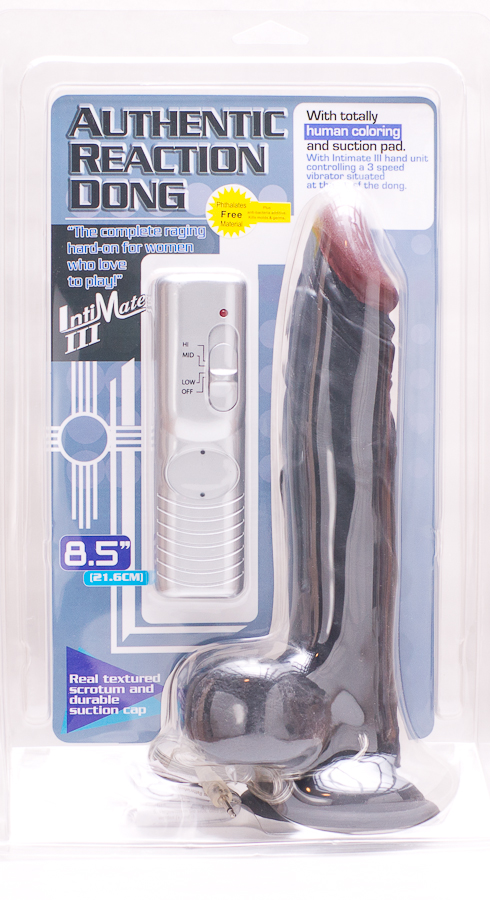 Черный вибратор с яичками